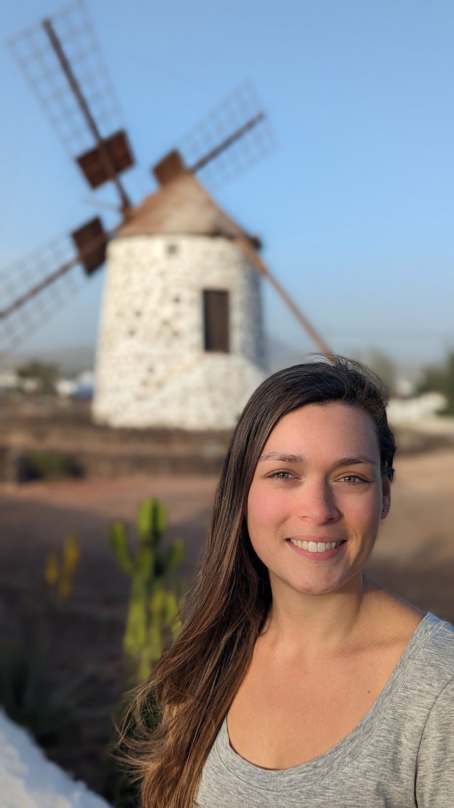 Judy Turcotte, social worker, by a traditional Canary Islands windmill